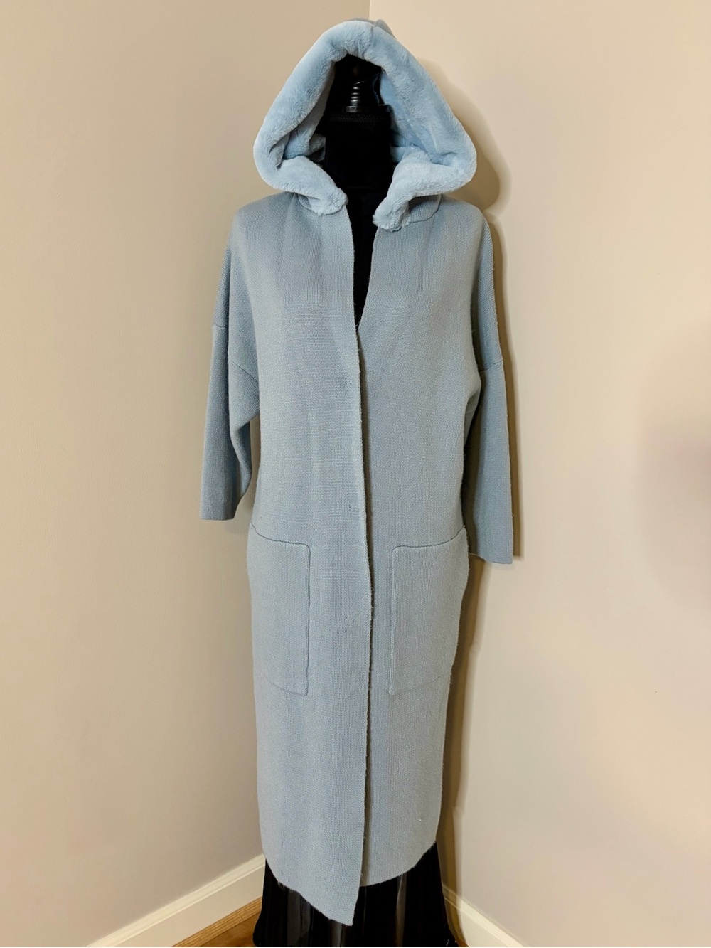 Celeste’s Pale Blue Hooded Longline Knit Coat